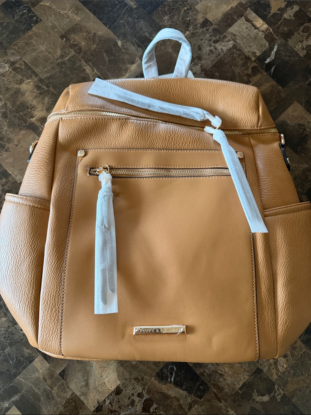 Poppy & Peonies Caramel Tan Vegan Leather  Backpack with Gold Hardware. 
BNWT